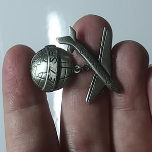 Silver toned jet set pin